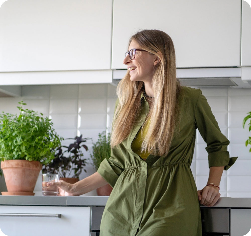 Standing besides kitchen counter
